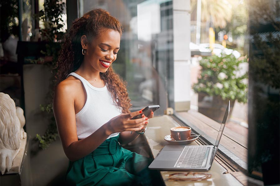 Female looking at mobile in restaurant