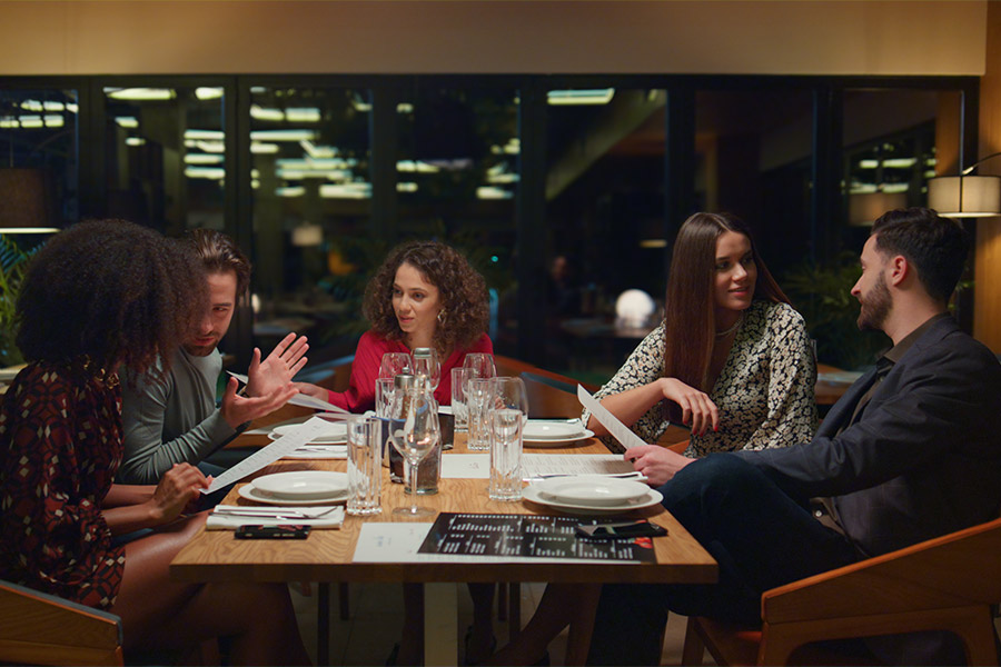 Group of friends at high class restaurant